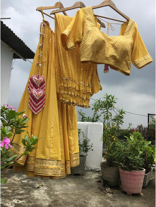 'ANINDITA' Yellow Mulmul Cotton Kalidar Ghaghra (Set Of 3)