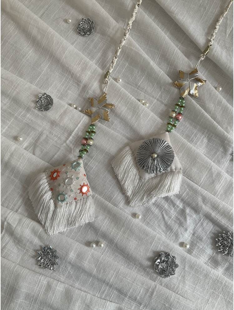 'JHILMIL' White Hand Crafted Tassels