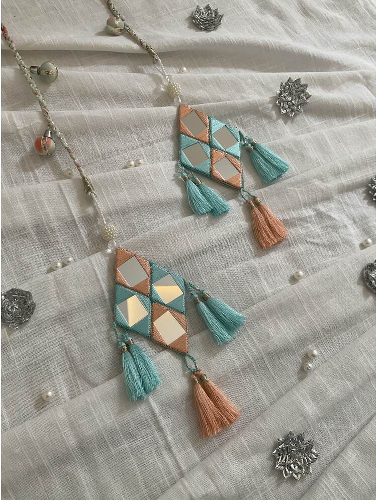 'APSARIKA' Blue & Off white Hand Crafted Tassels